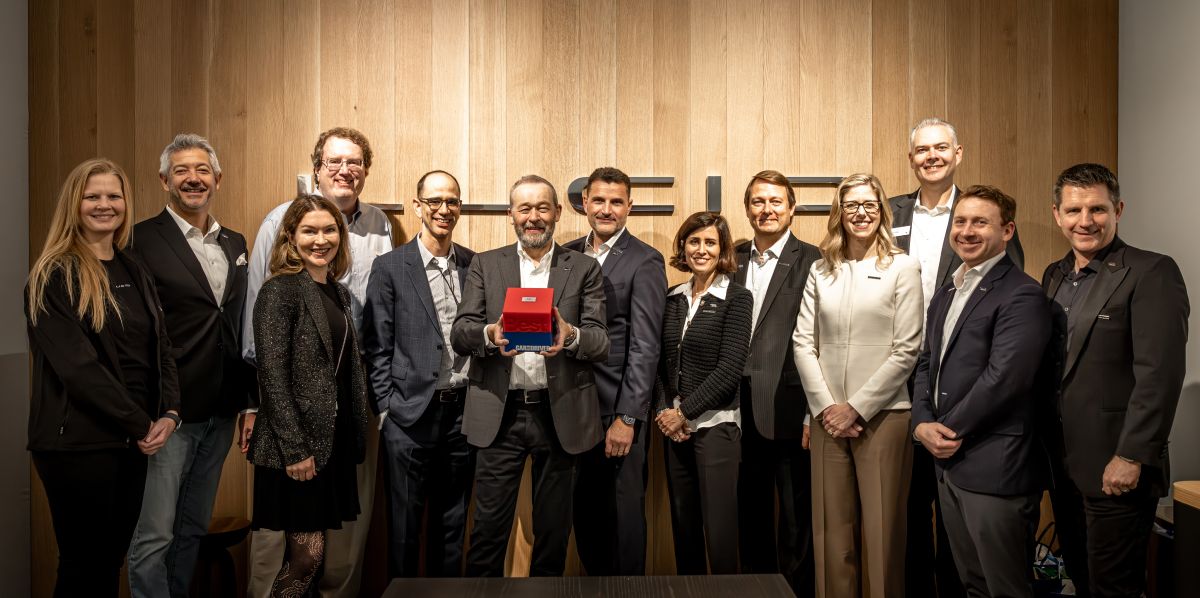 Claudia Gast and the Lucid team celebrating the Car and Driver 10Best award